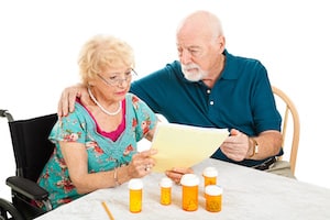 Elderly Couple Bills